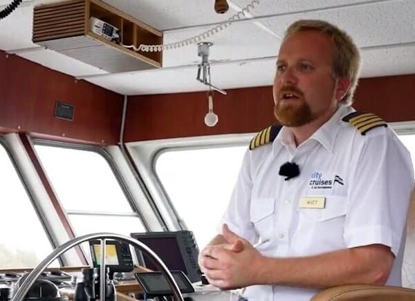 Captain of ship sits at the wheel and remembers why he loves the cruise industry.