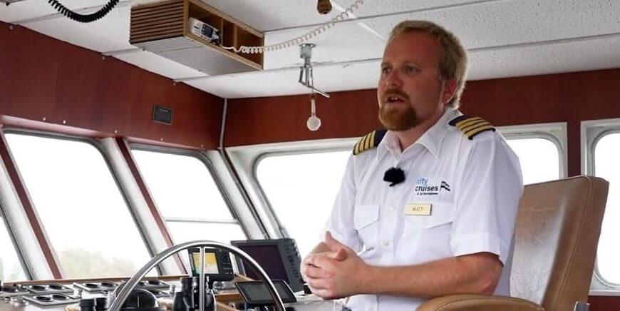 Captain of ship sits at the wheel and remembers why he loves the cruise industry.